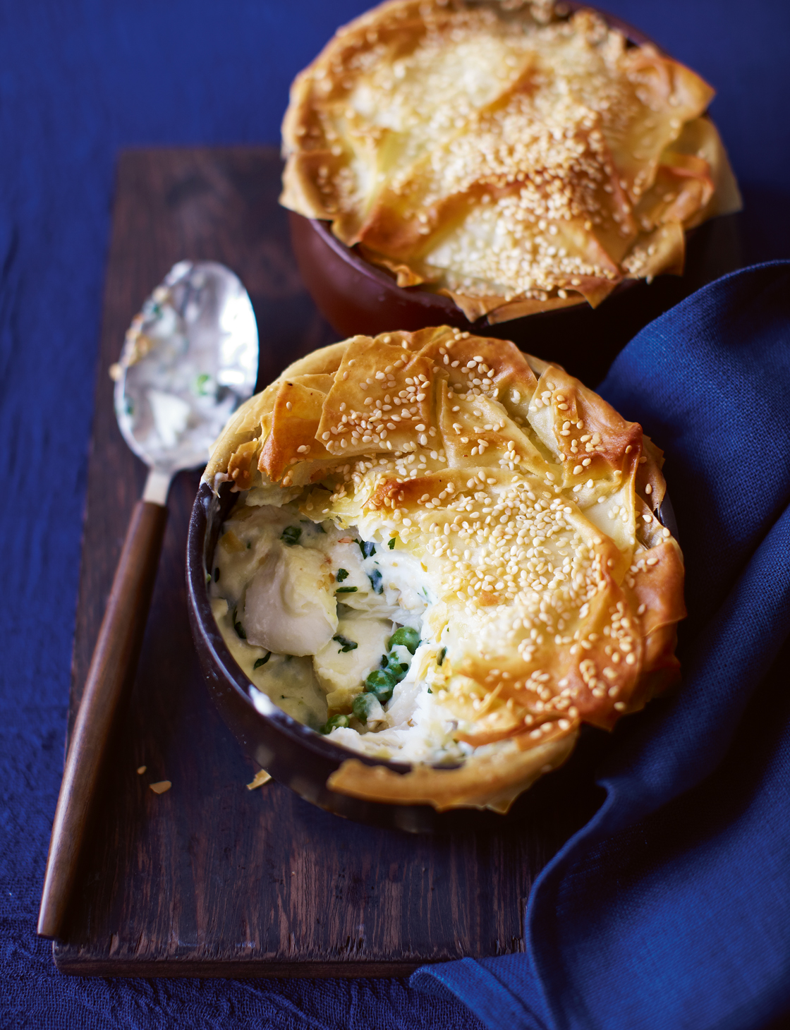 'Skinny' fish, pea and parsley pies with crispy sesame pastry
